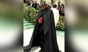 Usher's Met Gala Look Sparks Hilarious Comparisons: Phantom of the Opera or Tuxedo Mask?
